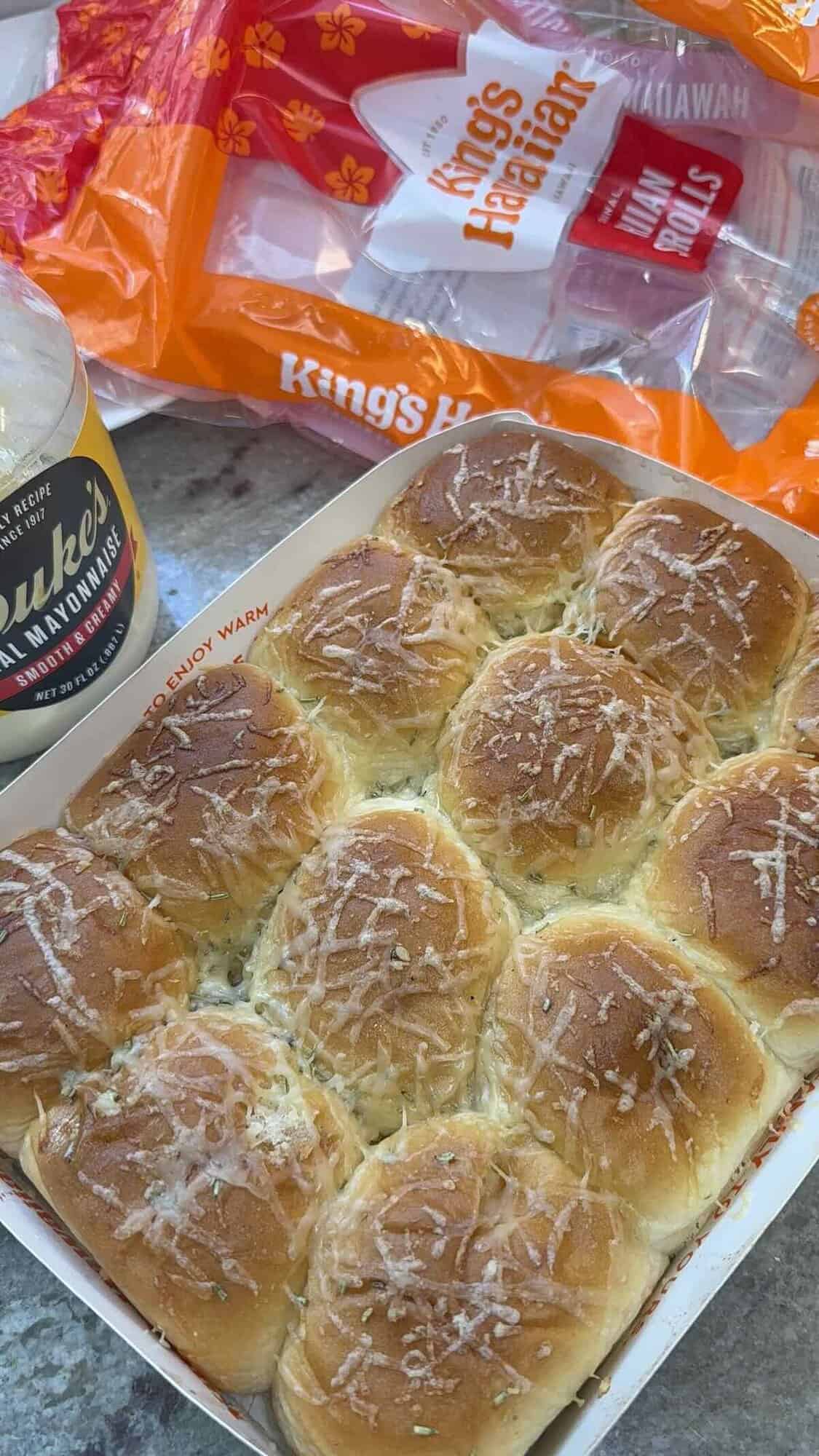 baked kings hawaiian rolls with butter rosemary and parmesan cheese