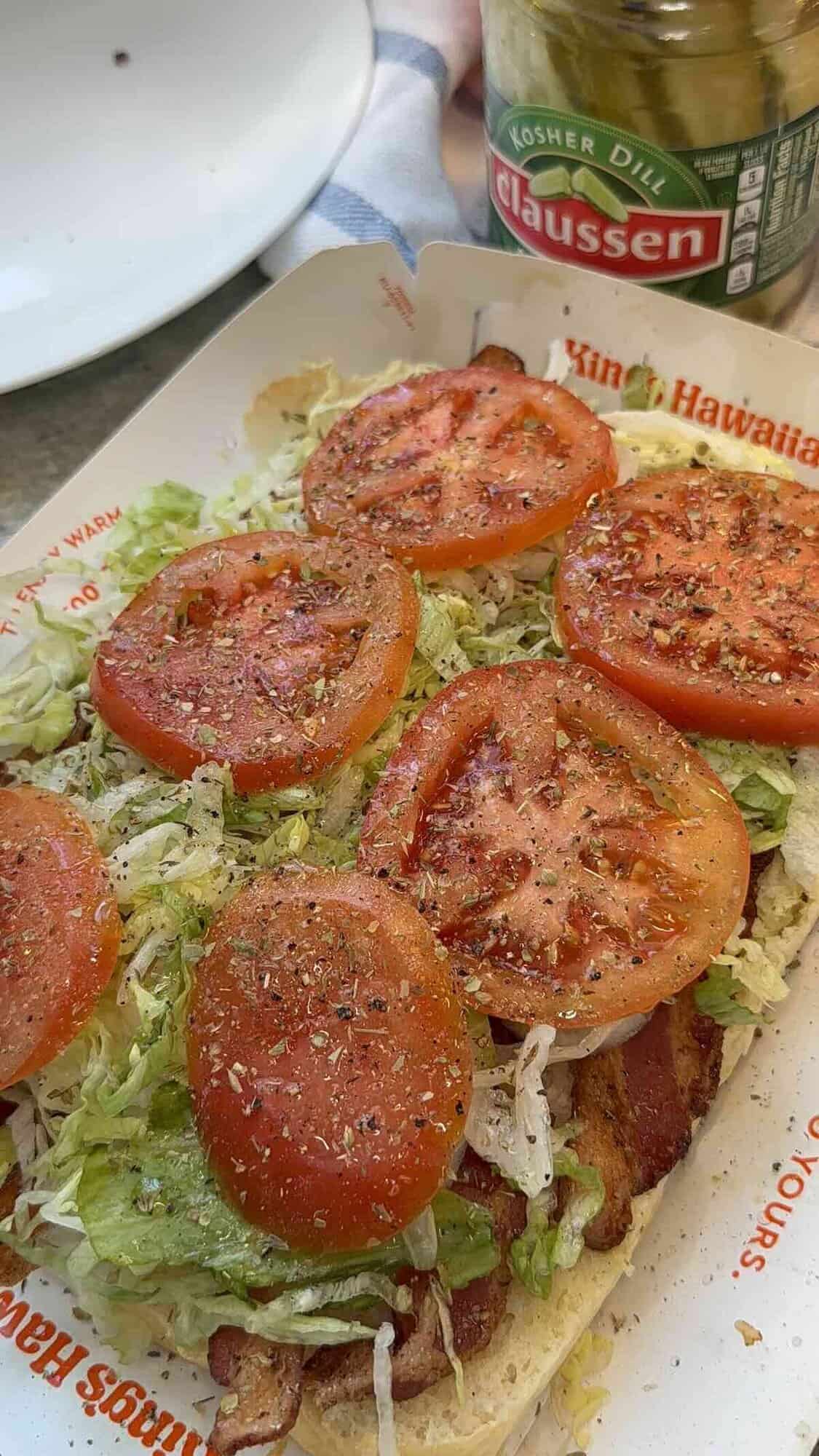 bacon lettuce and seasoned tomatoes on kings hawaiian rolls