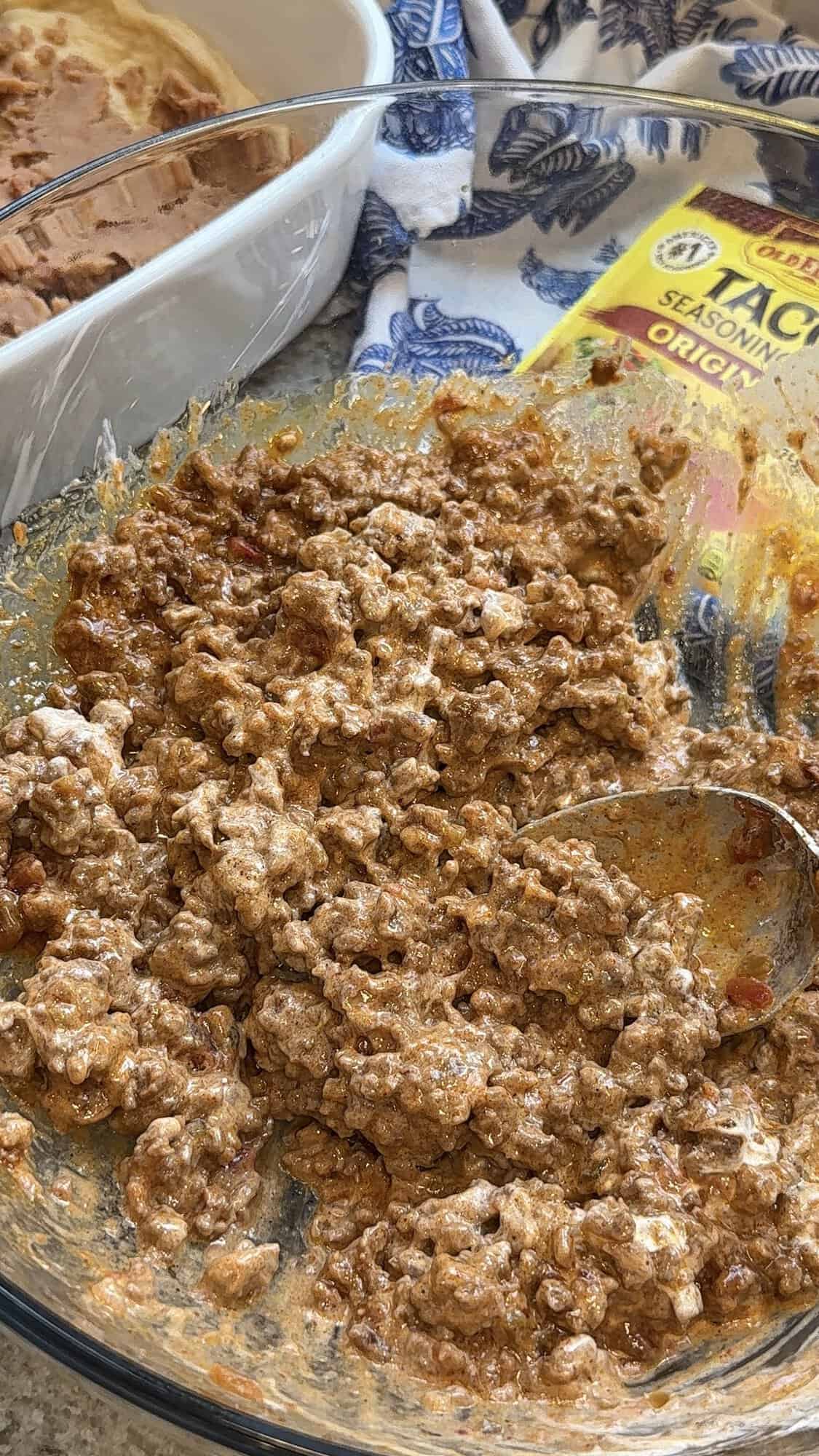 taco seasoned ground beef with sour cream and salsa