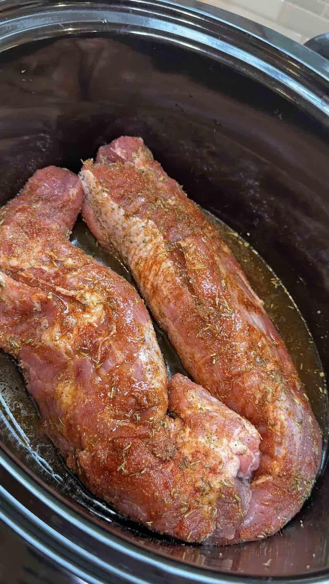 seasoned pork inside the crockpot