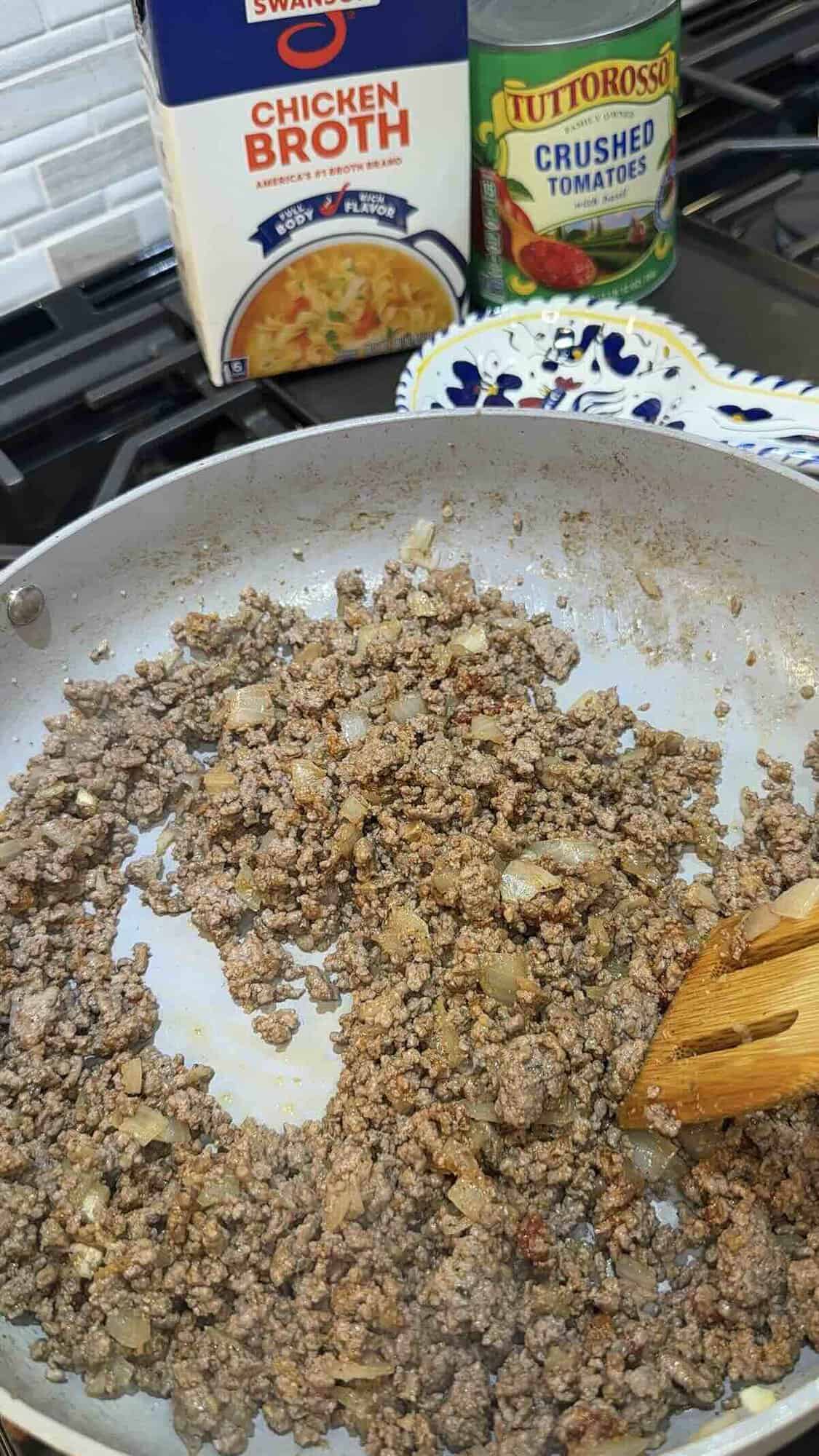 ground beef cooked in a skillet