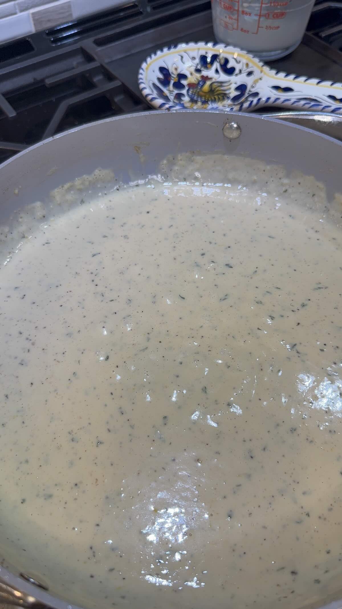 creamy lemon chicken sauce simmering